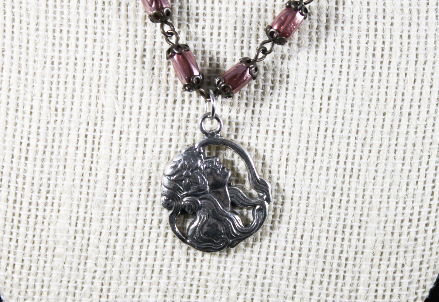 Czech Glass necklace with a silver pendant of a woman